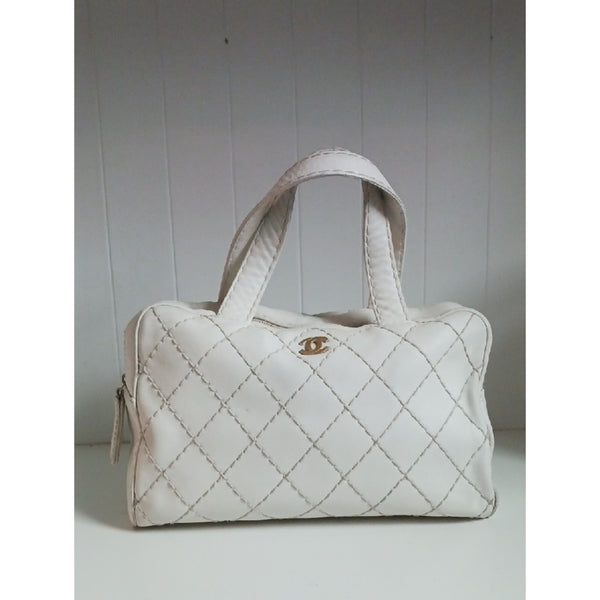 CHANEL VTG WHITE WILD STICH AS IS BAG.