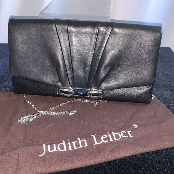 Judith Leiber black clutch with art decoration clasp