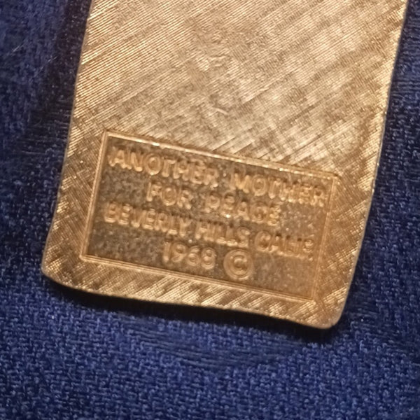 Vintage War Is Not Healthy Pendant.