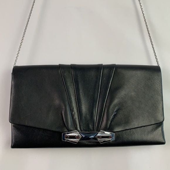 Judith Leiber black clutch with art decoration clasp