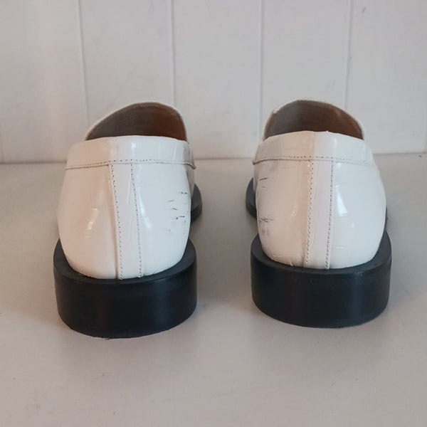 Stuart Weitzman White Croc Loafers.