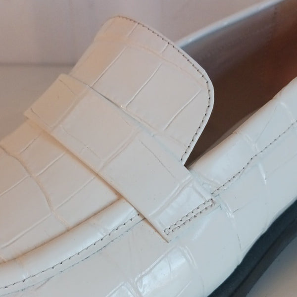 Stuart Weitzman White Croc Loafers.