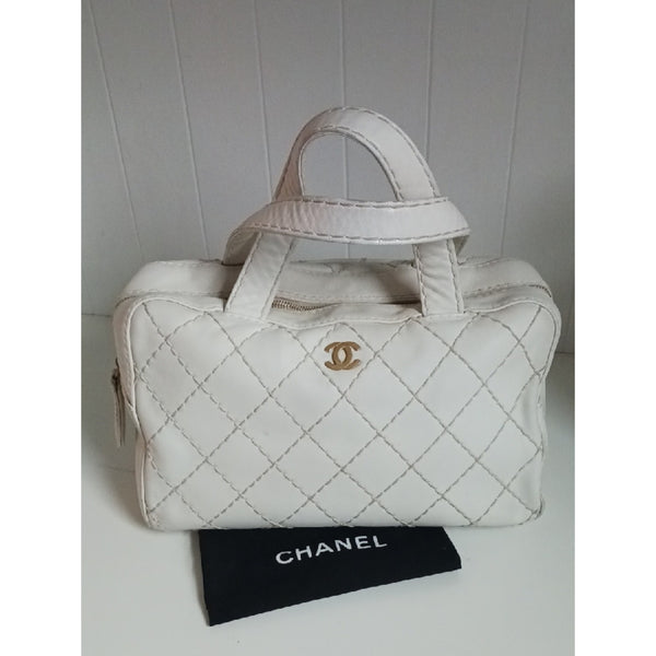 CHANEL VTG WHITE WILD STICH AS IS BAG.