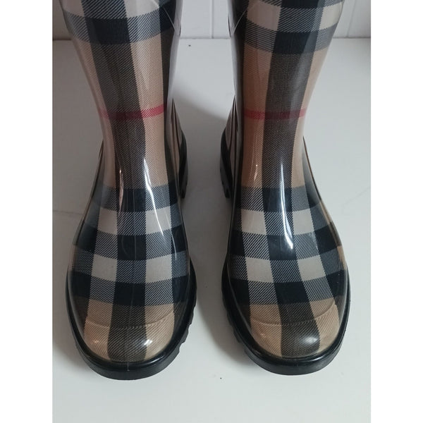 BURBERRY TAN PLAID RUBBER MID CALF RAIN BOOTS.