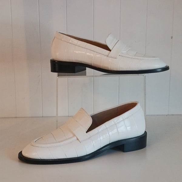 Stuart Weitzman White Croc Loafers.