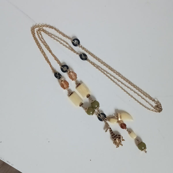 Kenneth Jay Lane Long Giraffe Multi Charms Necklace.