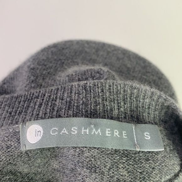Gray cashmere sweater with fur trim cuffs