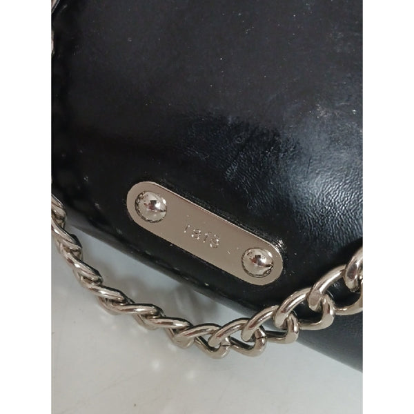 RAFE BLK LASER CUT PATENT CLUTCH.