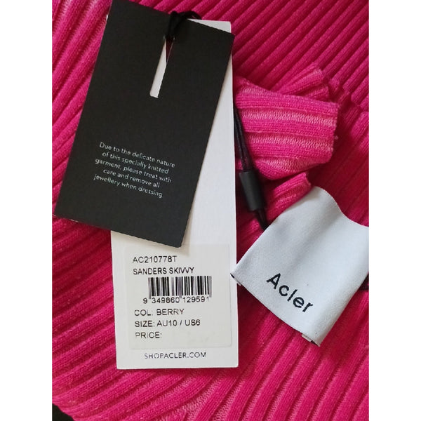 ALCER PINK RIBBED MOCK NECK SWEATER.
