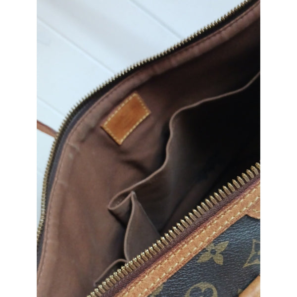 LOUIS VUITTON VTG STRAP SATCHEL BAG.