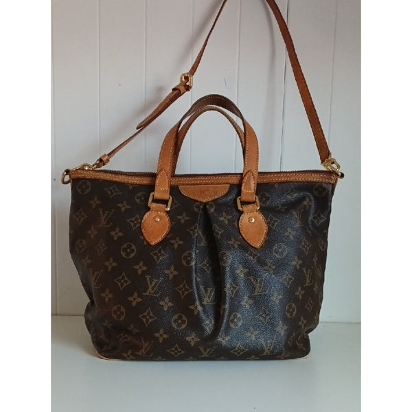 LOUIS VUITTON VTG STRAP SATCHEL BAG.