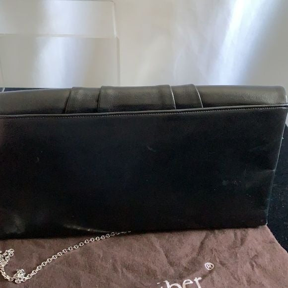 Judith Leiber black clutch with art decoration clasp