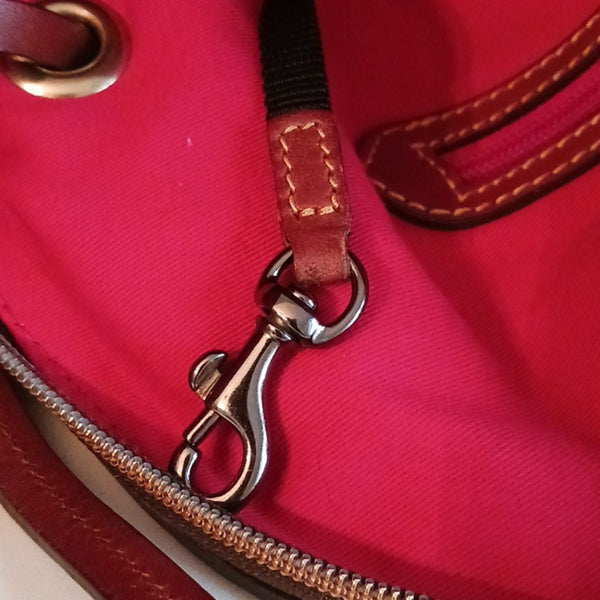 Dooney & Bourke Blue Canvas Tote With Leather Handles.