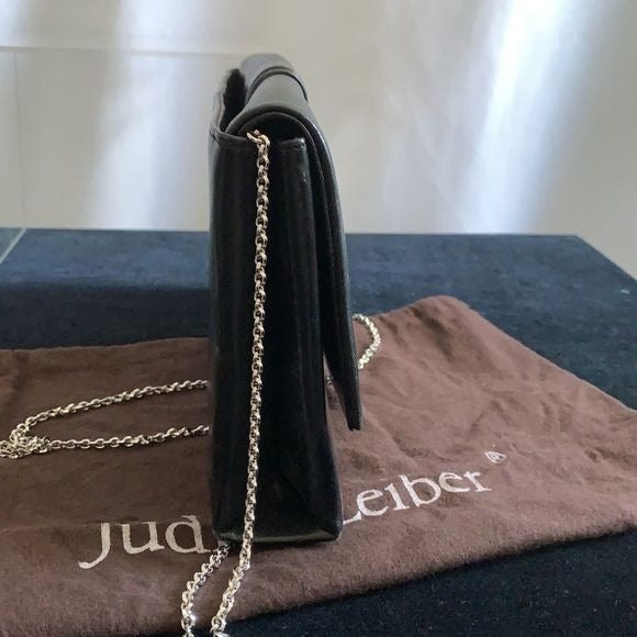 Judith Leiber black clutch with art decoration clasp