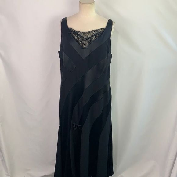 Montage by Mon Cheri black striped with lace and bows dress
