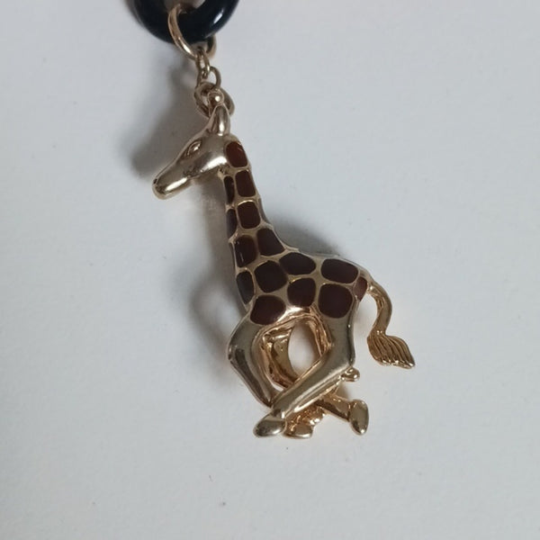 Kenneth Jay Lane Long Giraffe Multi Charms Necklace.